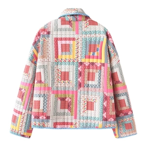 Back view of women's quilted patchwork jacket featuring colorful floral and plaid patterns