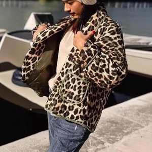 Chic leopard print quilted jacket with olive green lining and large front pocket