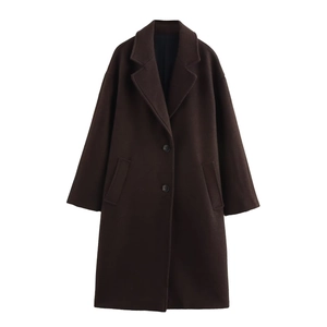 Detail view of coffee wool coat featuring a notched lapel and two-button closure