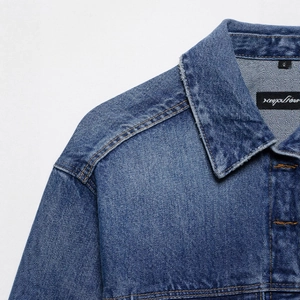 Mid-blue denim short jacket with classic turn-down collar and contrast yellow stitching