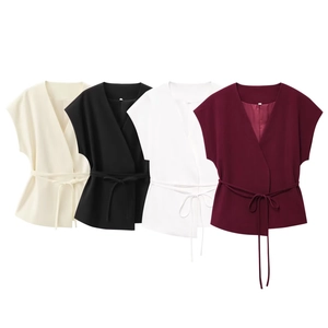 Detail showing four colors of sleeveless wrap tops with adjustable waist ties