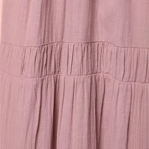 French tulle midi backless dress in dusty rose with detailed smocking texture
