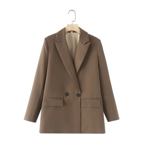 Detail of coffee brown double-breasted blazer showing notch lapels and flap pockets