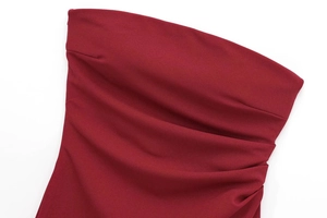 Detailed view of ruched side texture on this burgundy strapless top for women