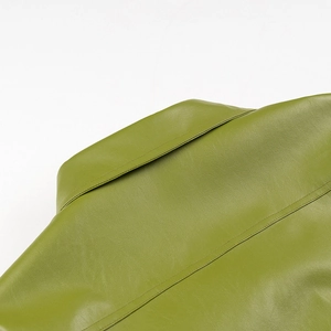 Detail of double stitching on back collar of green faux leather jacket for women