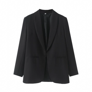 Detailed close-up showing the smooth black lining and white size label S on blazer collar
