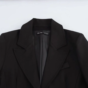 Women's chic black slim fit blazer with shoulder pads and classic notched lapel