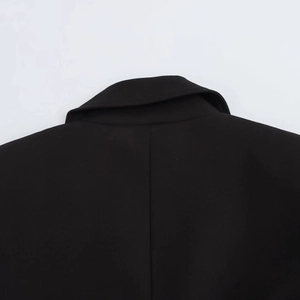 Back view of elegant black slim fit blazer with padded shoulders and neat collar seam