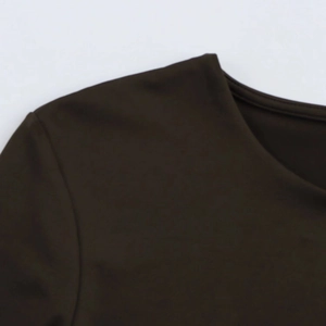 Close-up of crew neckline and fine stitching on a dark brown long sleeve bodysuit