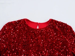 Detail of red sequin dress with round neck and teardrop back opening for women
