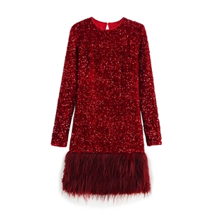 Sparkly red sequin long sleeve dress with feather hem detail for parties and events