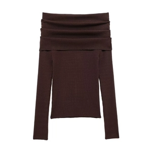Close-up of brown ribbed knit texture on off-the-shoulder long sleeve top