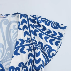Women's summer V-neck maxi dress with blue and white floral patterns and ruffle sleeves