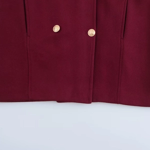 Classic wine red double-breasted coat with textured wool and gold embossed buttons