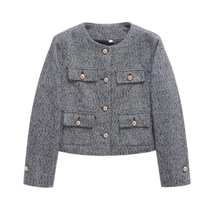 Women's classic black and white herringbone tweed jacket with gold logo buttons