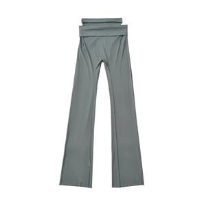 Detail of high-waisted grey yoga pants with a fold-over waistband and soft ribbed texture
