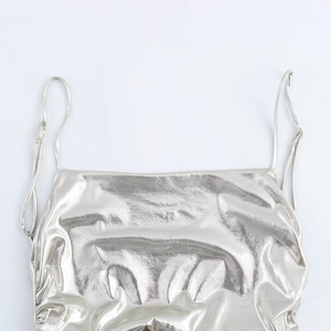 Futuristic silver metallic foil dress with adjustable spaghetti straps and pleated texture