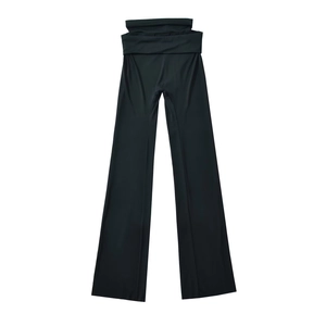 Women's black high-waisted flared yoga pants with wide waistband and elastic fabric