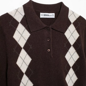 Women's brown knit polo shirt with classic argyle pattern and stylish short sleeves