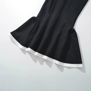 Women's 2025 fashion black tube top dress featuring a white contrast fishtail hemline