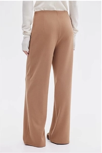Rear view of high-waist wide-leg trousers in camel showing elegant drape and back darts