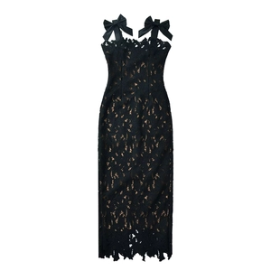 Elegant black lace camisole dress featuring shoulder bows and sheer floral textures