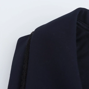 Slim fit crewneck dress in navy blue featuring delicate black lace detailing on shoulders
