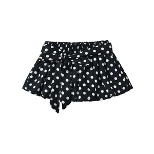 Polka dot mini skirt with ruffles and a decorative bow tie on elastic waist