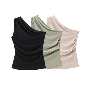 Detail of ribbed knit fabric texture on asymmetric one-shoulder sleeveless tops in three colors