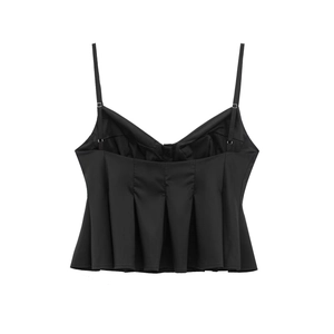 Detail of black poplin camisole showing adjustable straps and pleated peplum hem