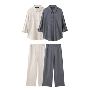 Women's 2-piece linen shirt and wide-leg pants set in striped beige and dark grey colors