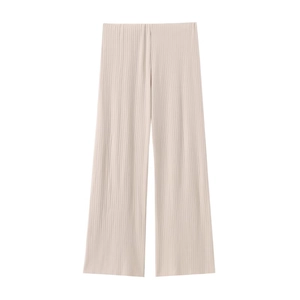 Detailed view of high-waist apricot wide leg trousers with premium vertical pleated fabric