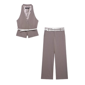 Completo donna grigio gessato con gilet e pantaloni larghi e cinture bianche sottili