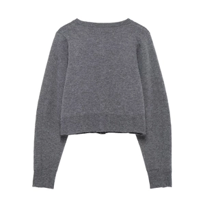 Rear view of dark grey knit cardigan with ribbed cuffs and soft fuzzy wool texture