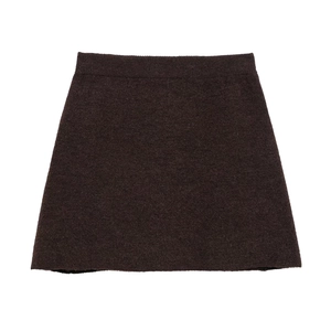 Close-up of deep coffee knit mini skirt featuring thick textured wool blend fabric