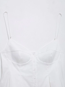 Detail of white poplin camisole top with spaghetti straps and button-up front closure