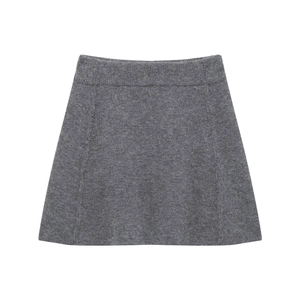 Detailed view of the dark grey knit mini skirt featuring a thick ribbed high waist texture