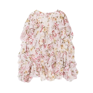 Close-up of multi-layer ruffles and floral chiffon texture on summer casual blouse