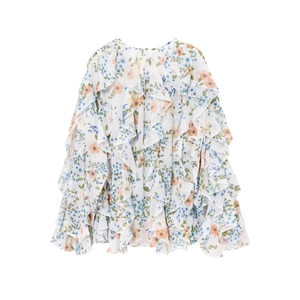 Detailed close-up of layered ruffles and floral print on women's sweet long sleeve shirt
