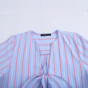 Women striped light blue cropped shirt with a large bow-tie detail and V-neckline