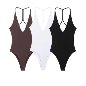 Three-piece bodysuit set in coffee, white, and black with V-neck and Y-back straps