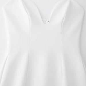 Robe ballon blanche élégante avec col en V et fermeture éclair pour le printemps 2025
