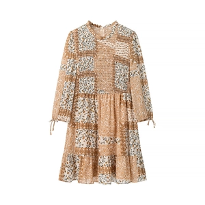 Floral boho dress in beige with smocked chest detail and layered ruffle hemline