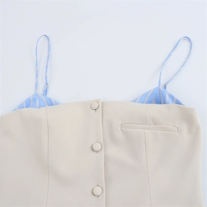 Beige poplin camisole dress with striped straps and button detail in a minimal style