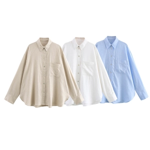 Linen shirts in beige, white, and blue with front pockets and curved hemlines