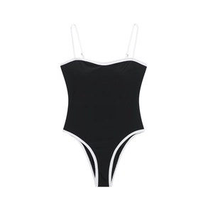 Minimalist black bodysuit with white piping trim and thin straps in a high-cut design