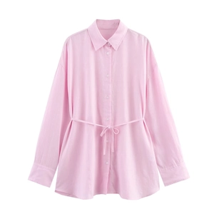 Pale pink long sleeve drawstring waist shirt with button-up front and classic collar