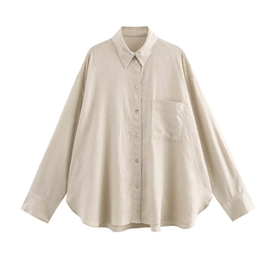 Minimalist oversized linen shirt for women in light beige with textured fabric and pocket