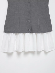 Detail of grey bodice with four buttons and white pleated poplin hem stitching