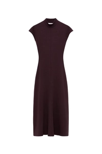 Close-up of the vertical center seam and knit texture on this burgundy mock neck dress